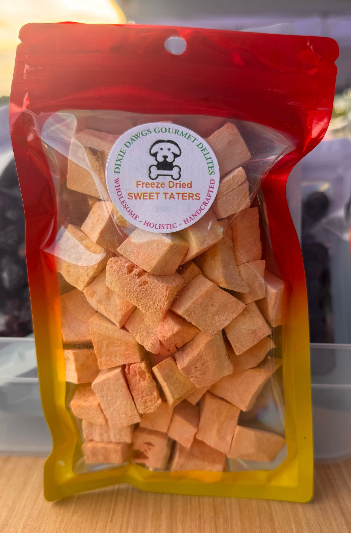 Package of freeze-dried sweet potatoes for dogs with a visible brand label.