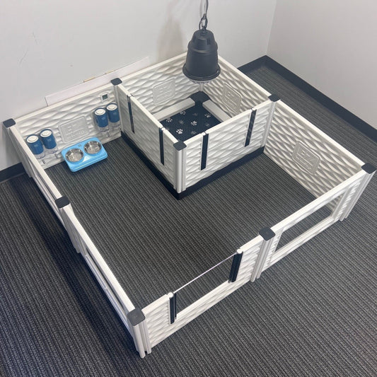 Pet playpen with various accessories on a carpeted floor.