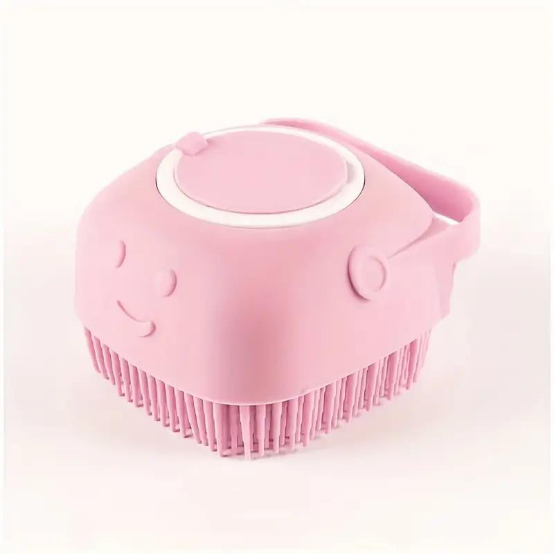 Pink silicone scrubber with a smiley face on a white background.