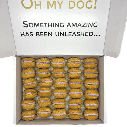 Box of dog treats with 'Oh My Dog!' branding and text.