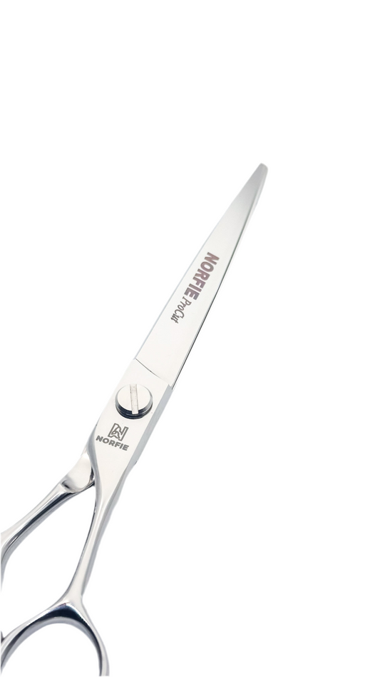 Hair cutting scissors with 'Kamen' branding on a white background