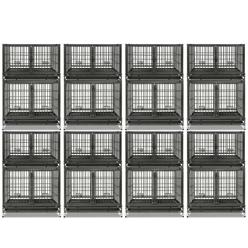Multiple black metal dog crates stacked on a white background