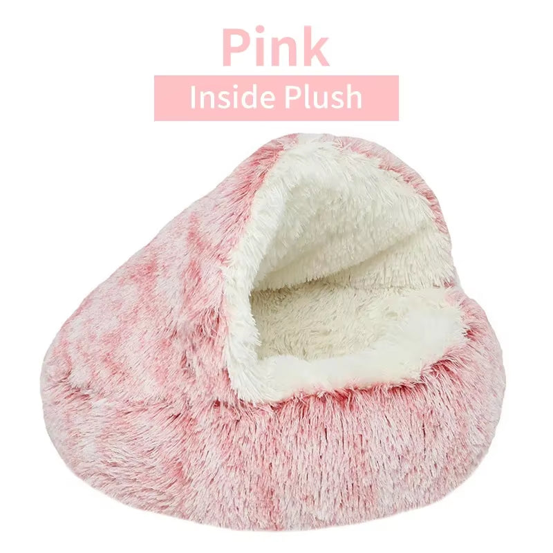 Pink cozy and comfortable plush pet bed with white interior on a white background.