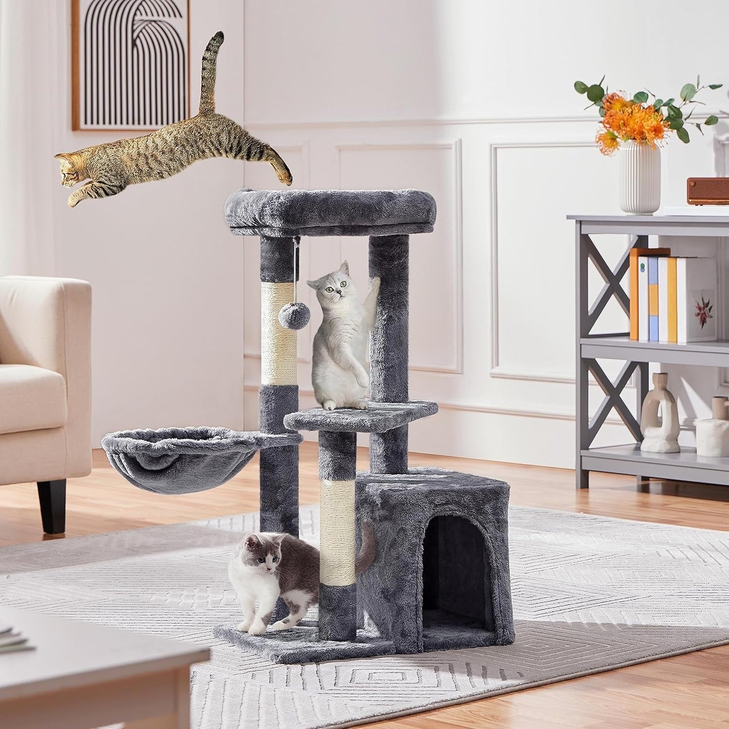 Cat tree with cats in a living room setting