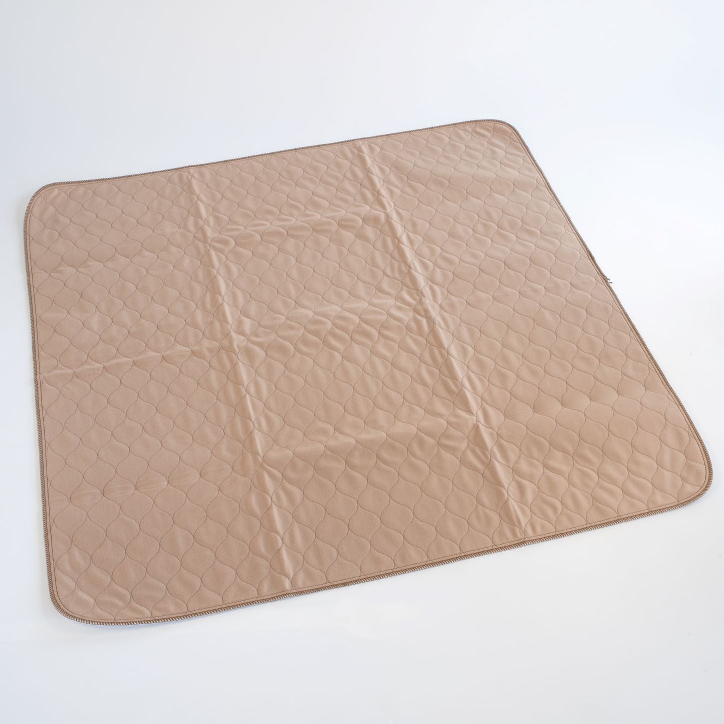 Beige textured mat on a white background