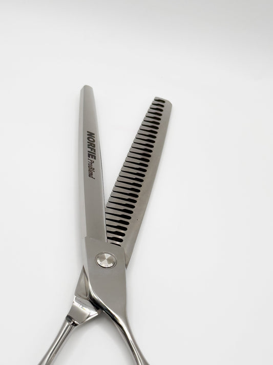 Hair cutting scissors with 'Norfie' branding on a white background