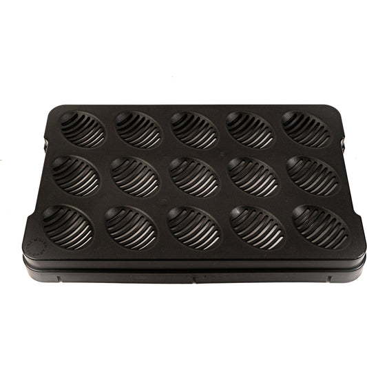 Black muffin tray with multiple compartments on a white background