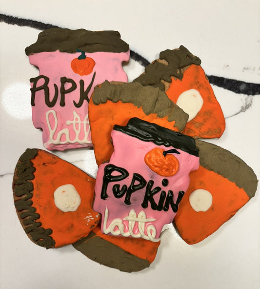 Decorative cookies shaped like pumpkin spice lattes with 'Pupkin Latte' text on a white background.