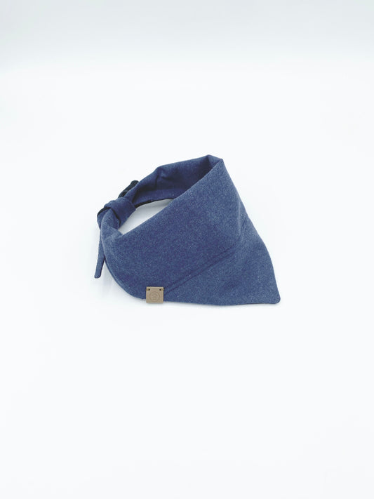 Blue bandana with a small tag on a white background