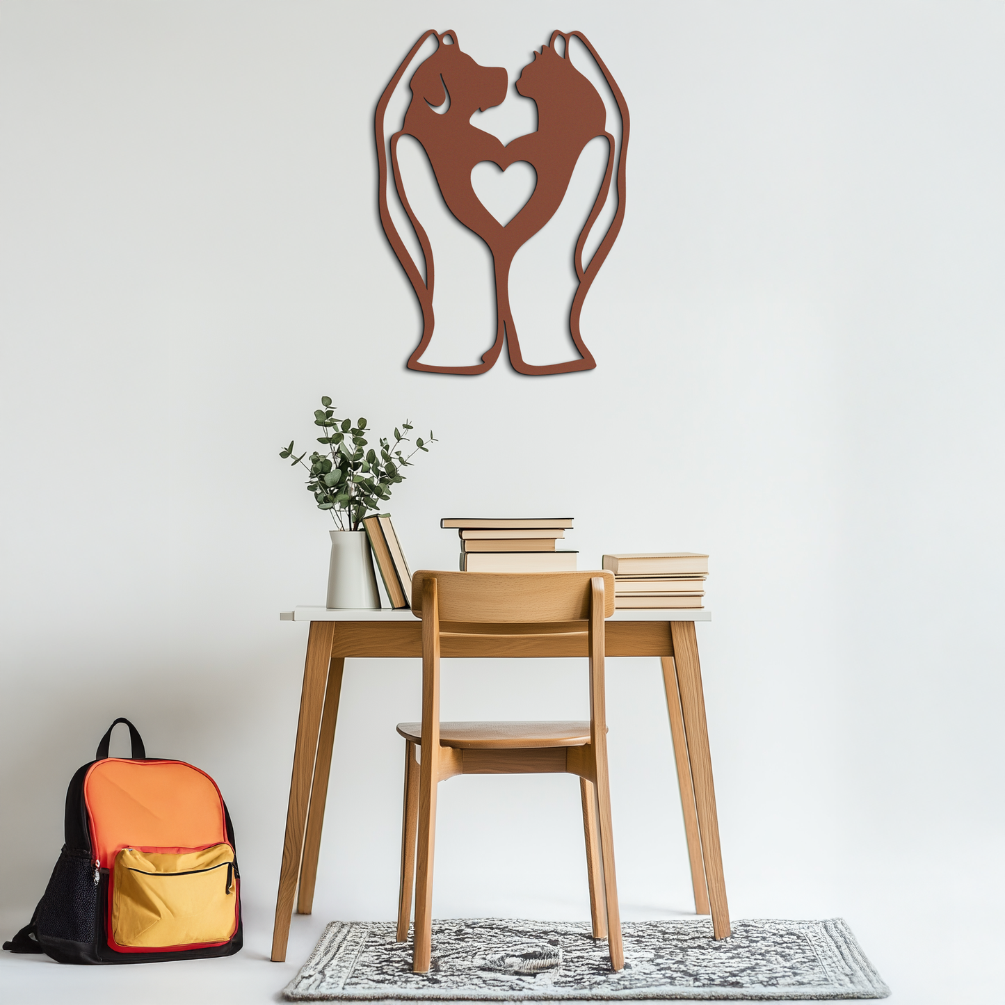 Wooden chair and table set with decorative wall art above, on a light gray background