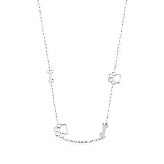 Silver necklace with paw and bone-shaped pendants on a white background