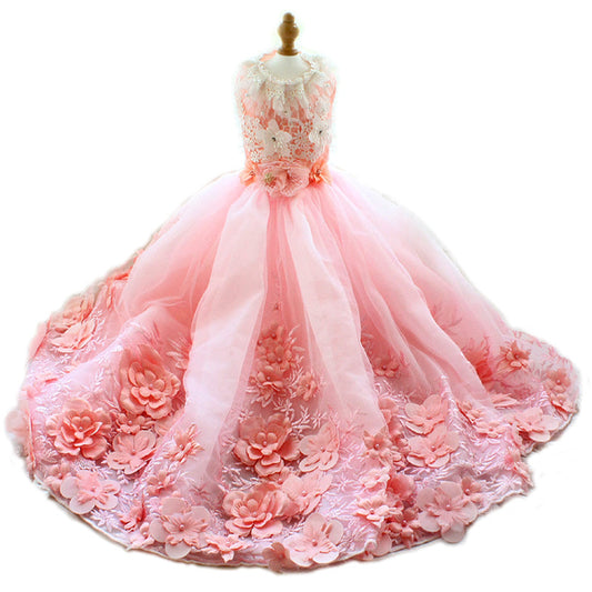Pink floral dress on a mannequin with a white background