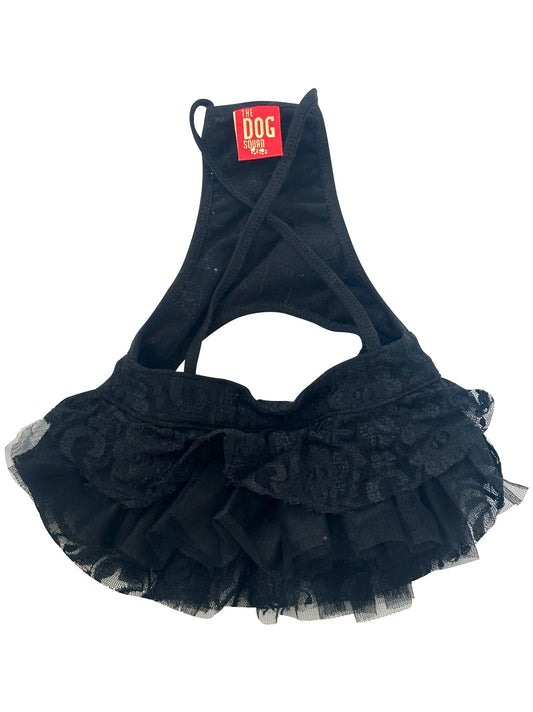 Black pet dress with ruffles on a white background
