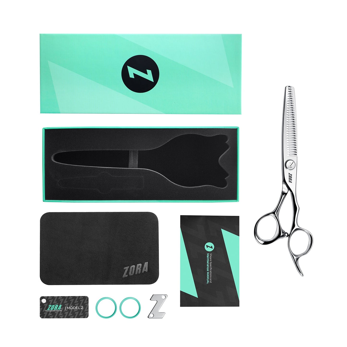 Zora hairdressing tools including scissors, a comb, and packaging on a white background