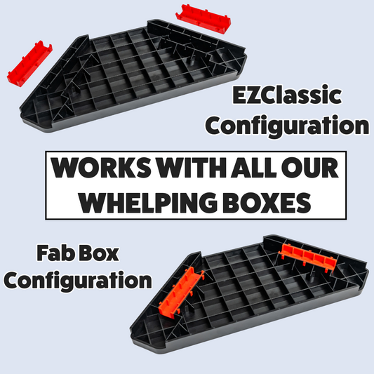 Two black plastic trays with red connectors on a light blue background, featuring text about compatibility with whelping boxes.