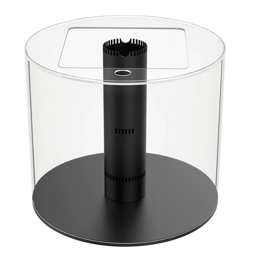 Black cylindrical object with a transparent top on a white background