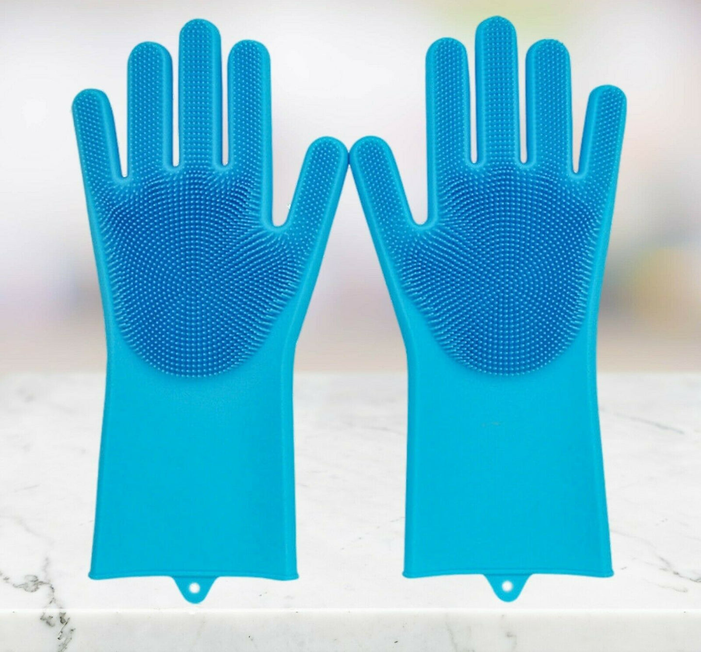 Pair of blue silicone gloves on a light background