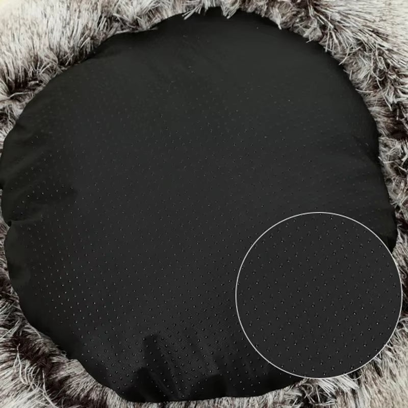 Black circular cushion on a textured surface with a close-up view of the fabric used to create the pet bed.