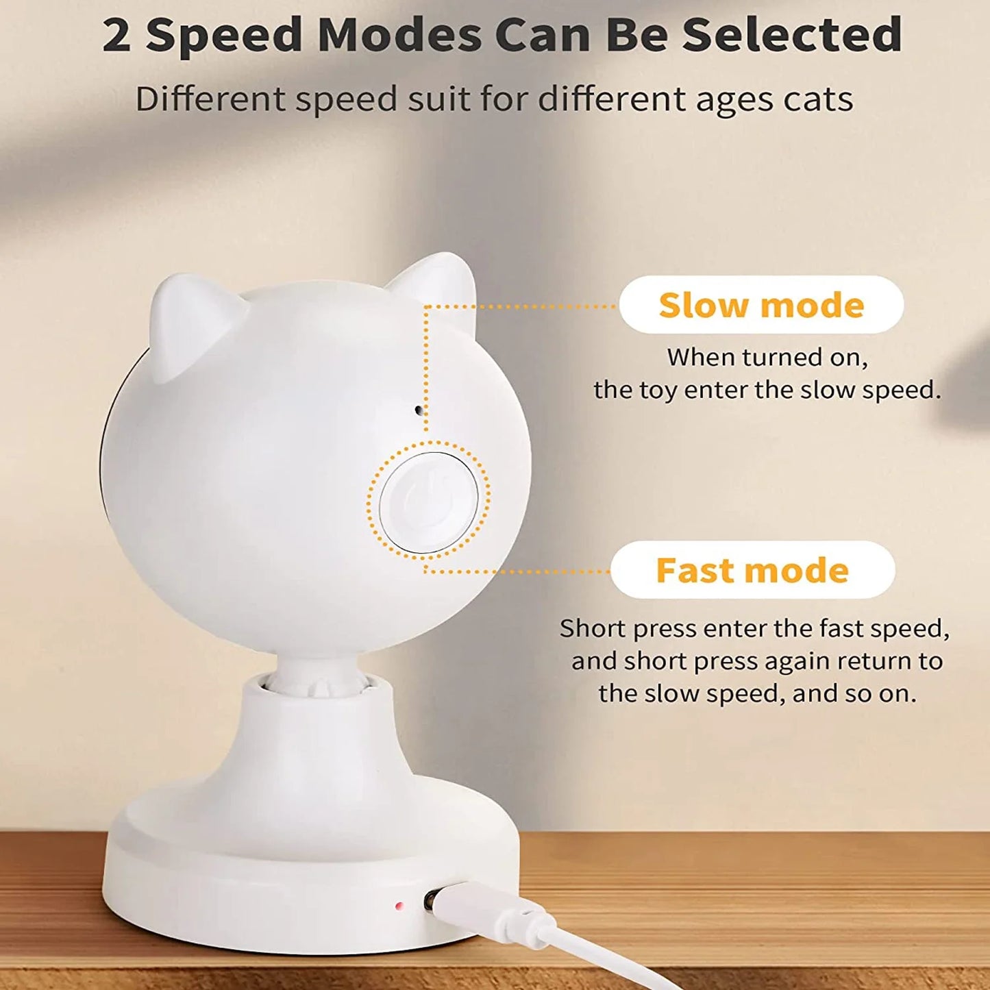Cat-shaped toy with speed control mechanism on a wooden surface.
