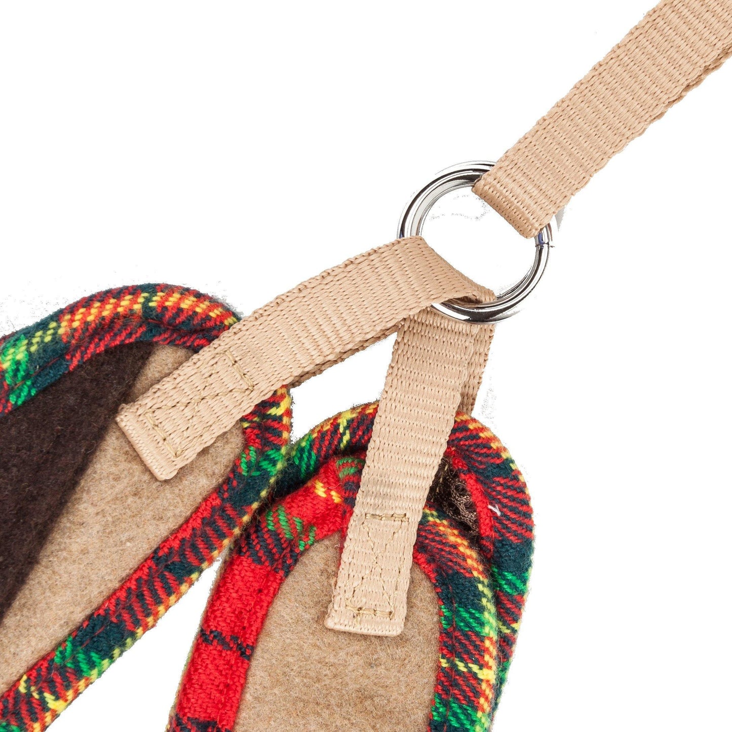 Close-up of a plaid dog harness with a metal ring on a white background