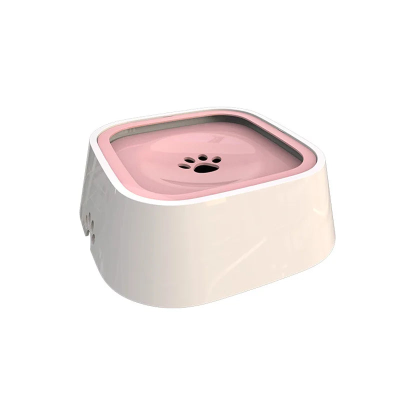 Pet water bowl with pink top and white base on a white background.
