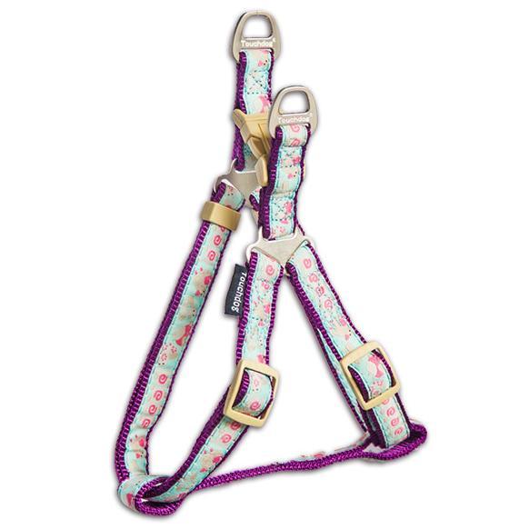 Floral-patterned dog leash with gold hardware on a white background