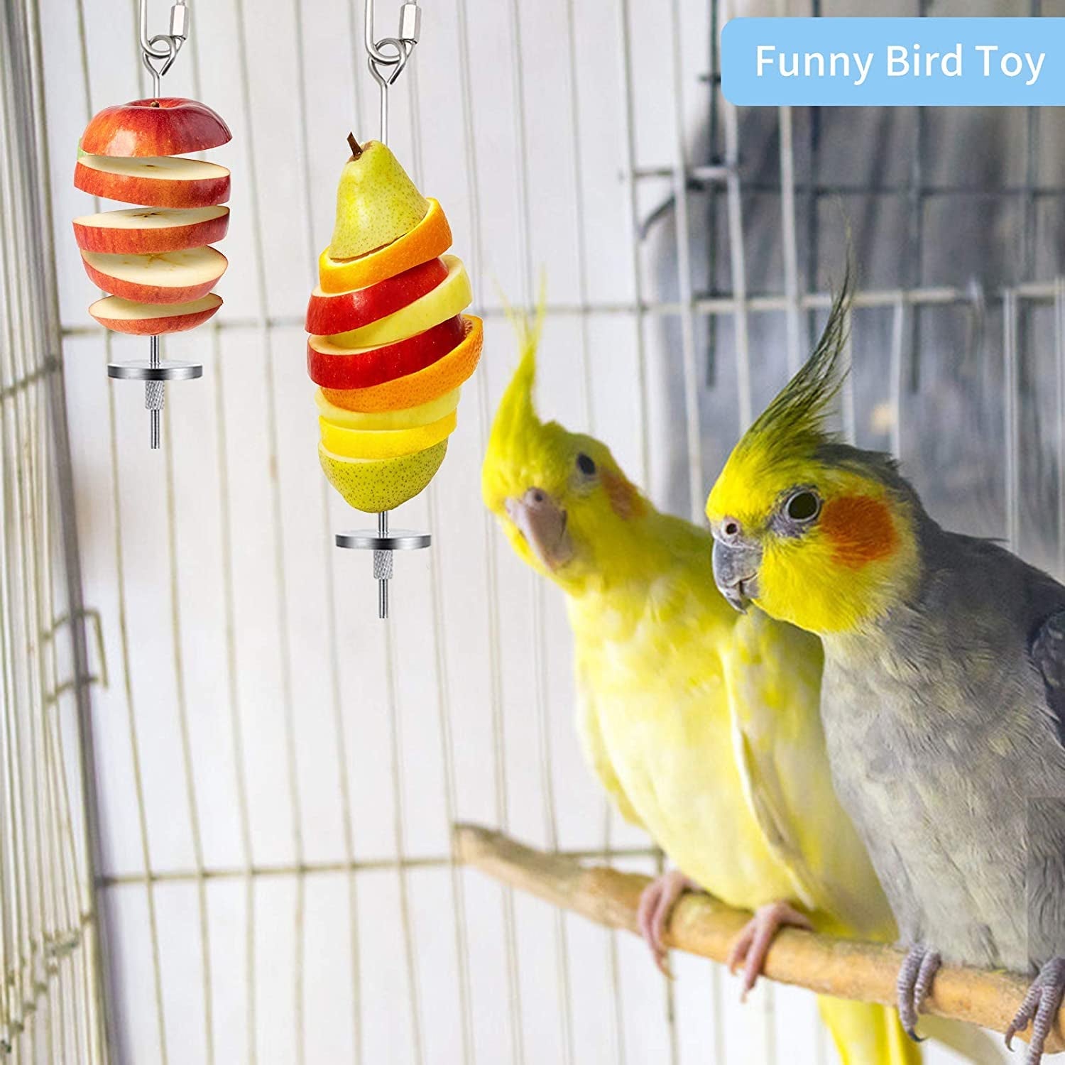 Two birds interacting with a colorful bird toy in a cage.