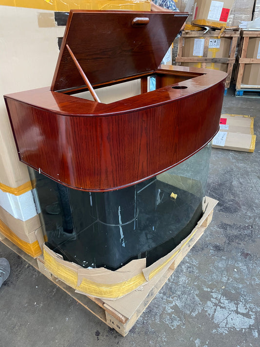 Wooden reception desk on a pallet in an indoor setting