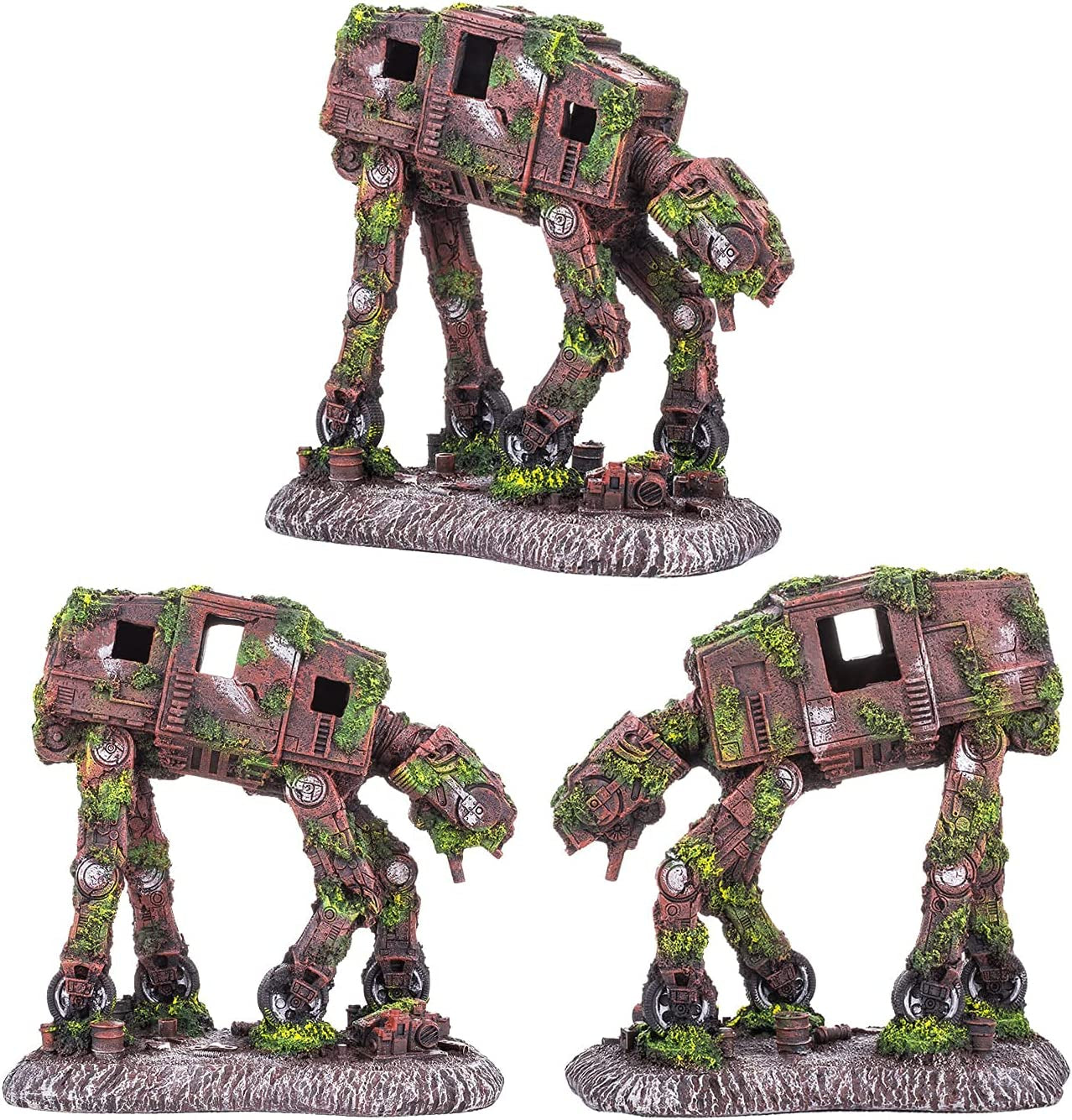 Three miniature models of AT-AT walkers with a mossy texture on a white background