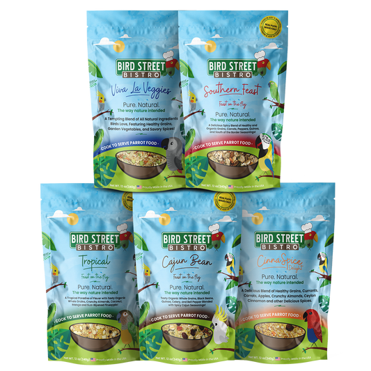 Five packages of Bird Street Bistro parrot food on a white background