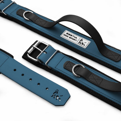 Blue dog collar with black accents and a visible brand logo on a white background