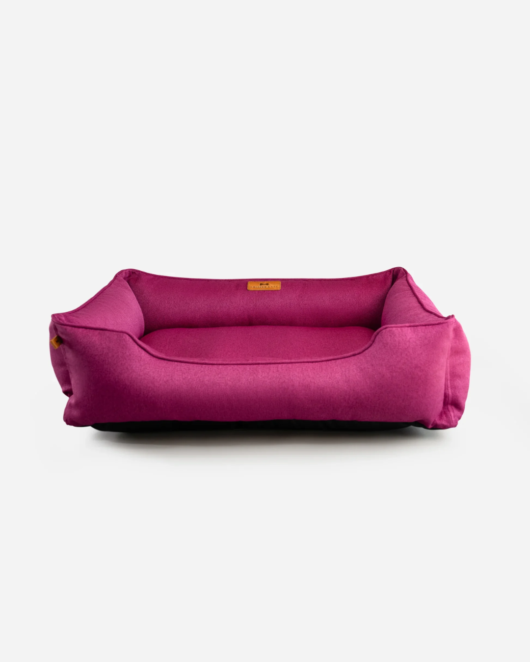 Pink pet bed on a white background