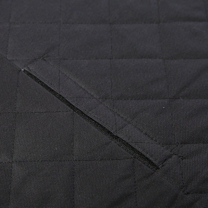 Close-up of a black quilted jacket with visible stitching details.