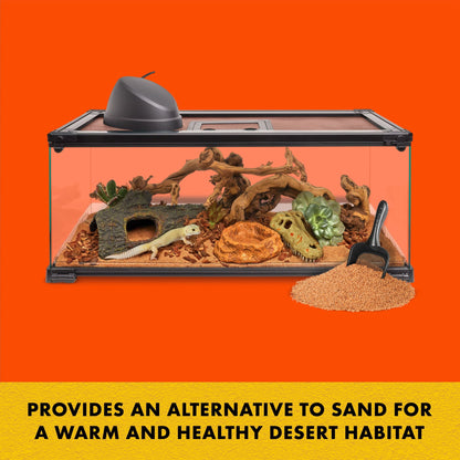 Reptile terrarium with sand substrate on an orange background
