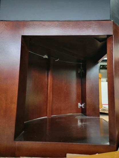 Wooden cabinet with a glass panel on a gray background