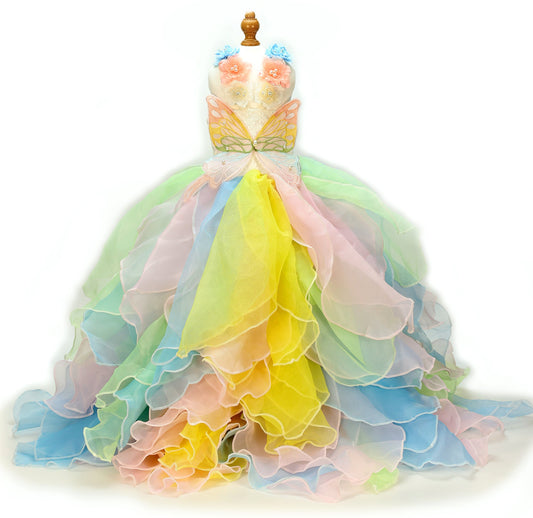 Colorful dress on a mannequin against a white background