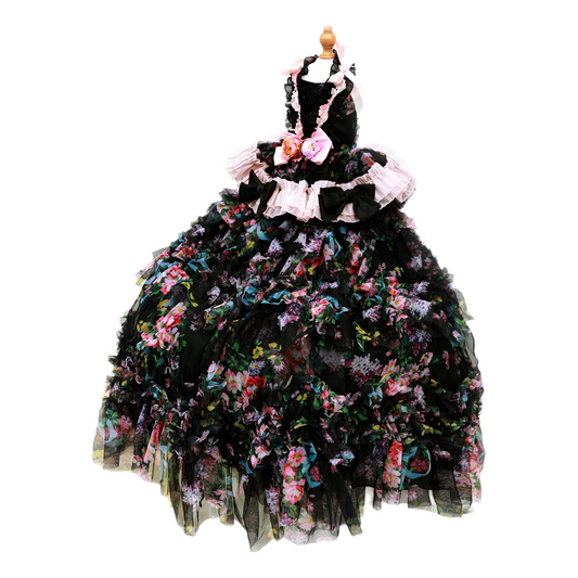 Black floral dress on a mannequin against a white background