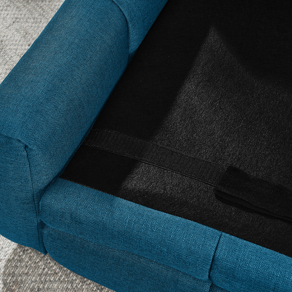 Close-up of a blue fabric surface with a textured pattern