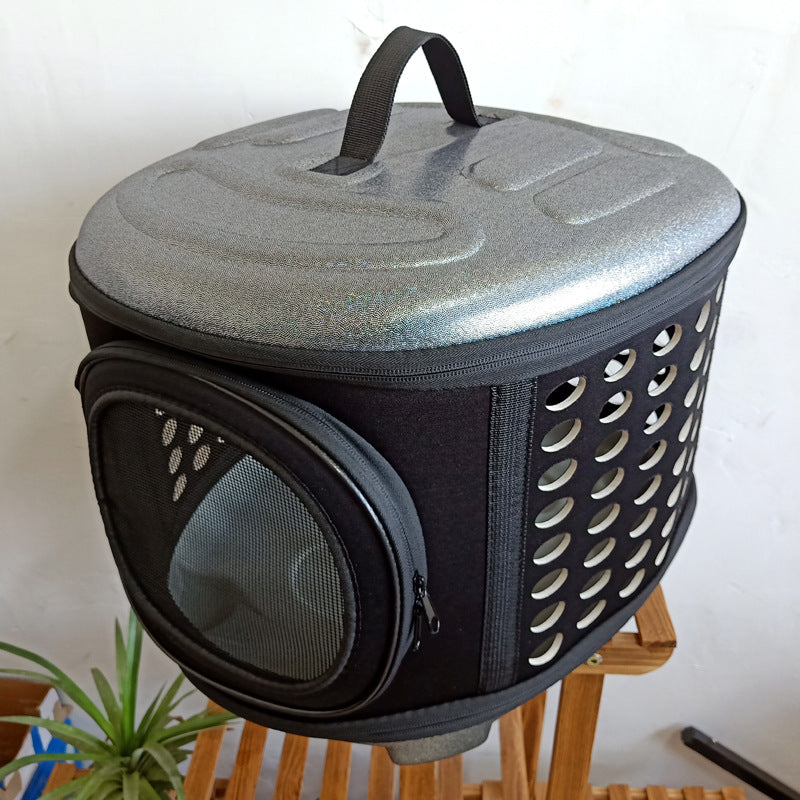 Pet carrier with a textured top and perforated sides on a white background