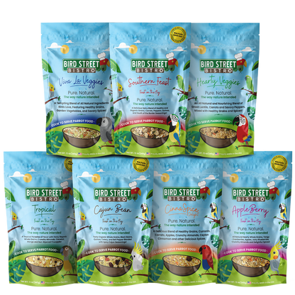 Assorted packages of Bird Street Bistro pet food on a white background