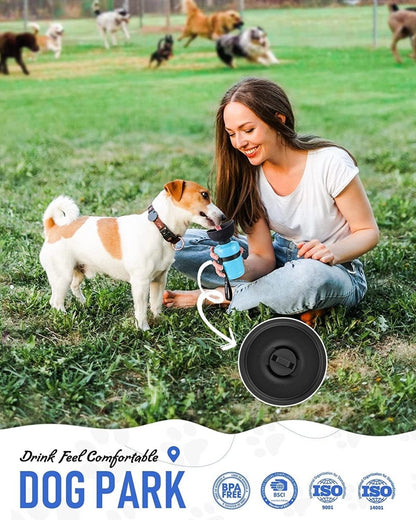 Woman sitting on grass with a dog, both holding a water bottle, with 'Dog Park' branding at the bottom.