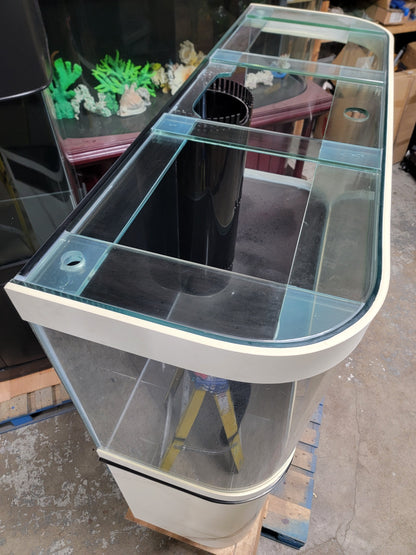Clear fish tank on a pallet with a blurred background