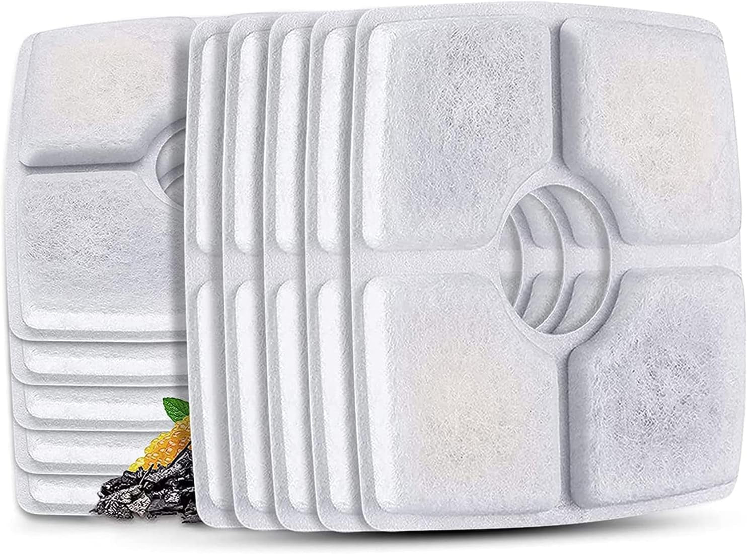 Set of white filter pads with a central circular design on a white background