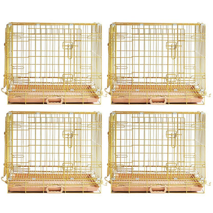 Four gold wire bird cages on a white background