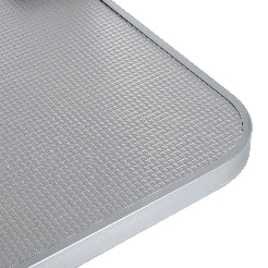 Close-up of a textured gray surface with a white border