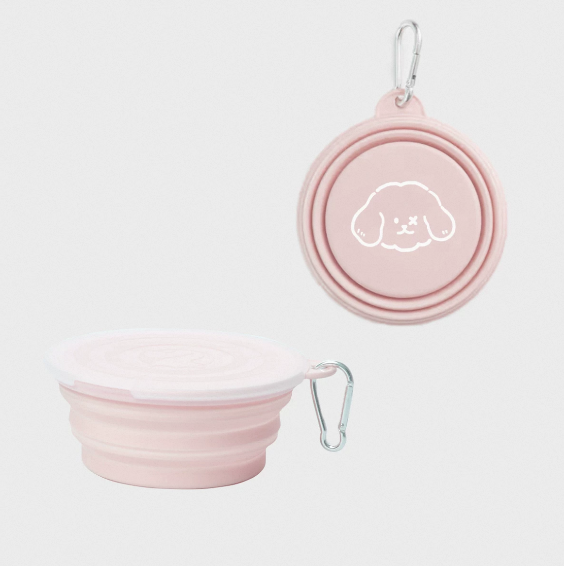 Pink collapsible dog bowl with lid and carabiner on a white background