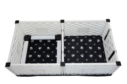 Pet playpen with black paw-patterned mats on a white background