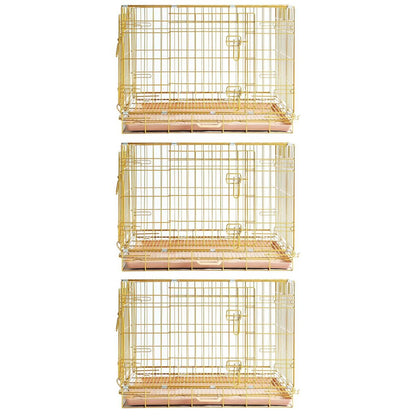 Three gold wire bird cages stacked on a white background