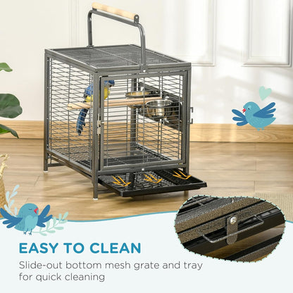 Pet cage with slide-out bottom mesh grate and tray on a wooden floor.
