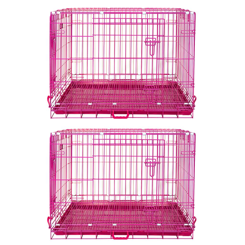 Two pink metal dog crates on a white background